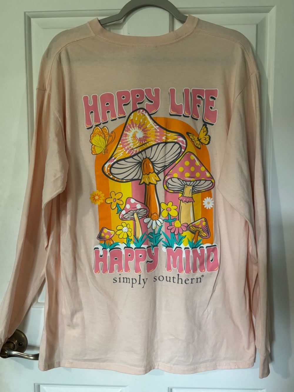 Women’s long sleeved Simply Southern tee. Fun retro mushrooms on back. Size lg.